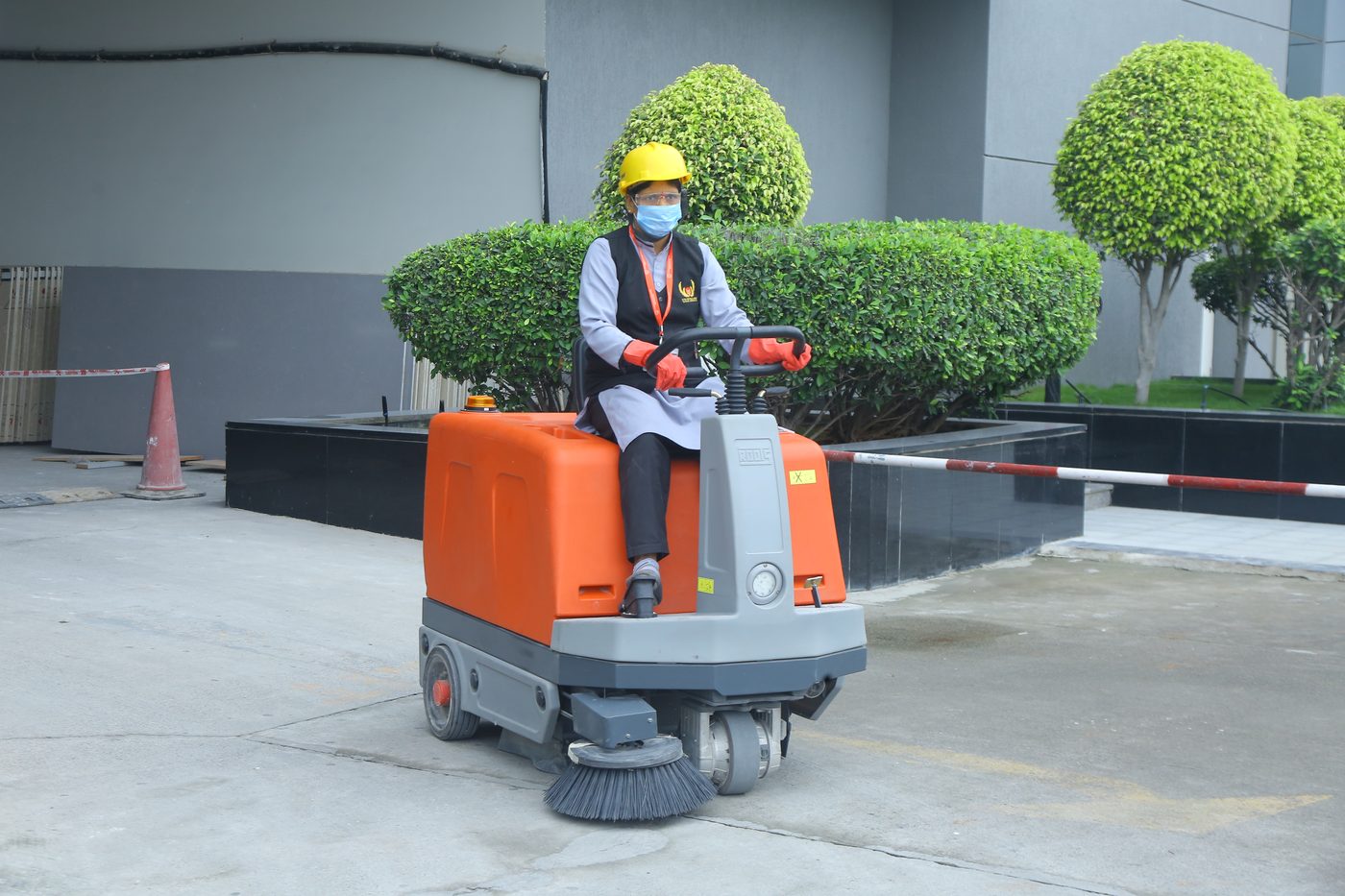 UFMS ride-on sweeper at client campus